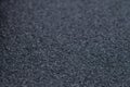 Waterproof bitumen insulation material background texture, closeup. Shallow depth of field. Royalty Free Stock Photo