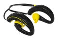 Waterproof earphones, yellow and black, beaded with water on a b