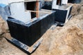 Waterproofing foundation bitumen. Foundation Waterproofing, Damp proofing Coatings. Waterproofing house foundation with spray on Royalty Free Stock Photo