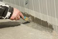 Waterproofing an outside wall-floor connection with ms polymer sealant