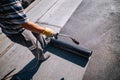 Waterproofing the rooftop terrace at new house construction