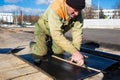 Waterproofing works with roll roofing felt Royalty Free Stock Photo