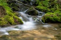 Water Tumbling Between The Moss Covered Rocks Royalty Free Stock Photo