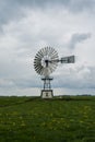 `Waterschap` metallic architect windmill monument. Typical dutch holland landscape. Royalty Free Stock Photo