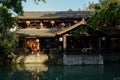 Waterside tile-roofed building in sunny afternoon,Jinli pedestrian street