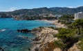 Waterside view turquoise sea rocky coastline of Paguera beach, Palma de Mallorca, Spain Royalty Free Stock Photo