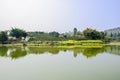 Waterside village in flowering sunny spring