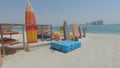 Watersports equipment on display on a beach