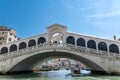 Watertaxi Passing Under Venice\'s Historic Rialto Bridge Royalty Free Stock Photo