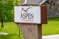 Sign for Aspen Village, a hotel and motel complex for tourists to stay in town