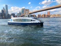Waterway Boat at Lower Manhattan, next to Brooklyn Bridge, New York.