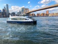 Waterway Boat at Lower Manhattan, next to Brooklyn Bridge, New York.