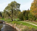 Waterway in the park, pathway, trees, Fall season