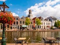 Waterways and street with historic houses in the center of the Dutch student city Leiden. Royalty Free Stock Photo