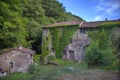 Waterwheel stone house in the forrest italy