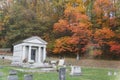 Watkins Glen,New York, U.S.A - October 17, 2022 - A cemetery with a Mausoleum of Barrett Rothschild and the background of fall