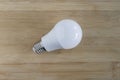 8 watt LED bulb white light on wooden