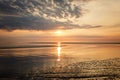 Wattenmeer, mud tideland in North Sea, Germany. Nordsee, Watt by sunset. Royalty Free Stock Photo