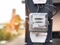Watthour electricity meter for using in home measure the electricity cost, has copy space, Home technology development with light. Royalty Free Stock Photo