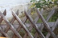 Wattle fence in Garden. Garden wooden fence. Royalty Free Stock Photo