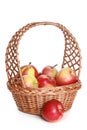 Wattled basket with delicious red apples Royalty Free Stock Photo