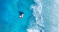 Wave and boat on the beach as a background. .Beach and waves from top view. Turquoise water background from top view. Top view fro Royalty Free Stock Photo