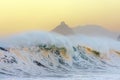 Wave breaking in Bakio near gaztelugatxe at sunset Royalty Free Stock Photo