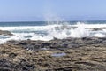 Waves breaking on the rocks by the ocean NSW Australia