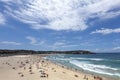 Wave breaks and surf on clear sand of famous Australian Sydney B
