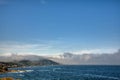 Dark clouds. Storm clouds. Wave of clouds that advances to the coast. One half of the sky cloud covers Royalty Free Stock Photo