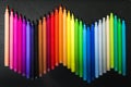 Wave of colorful magic maker on black background Royalty Free Stock Photo