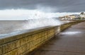 Wave crashed over sea wall in Herne Bay, Kent, Uk