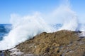 Wave crashing against reef