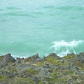 Wave crashing on a cliff