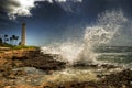 Wave Crashing in front of Barbers Point Lighthouse Royalty Free Stock Photo