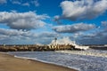 Wave Crashing on Jetty in Ocean Royalty Free Stock Photo