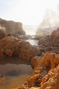 Wave crashing over rocks in Portugal Royalty Free Stock Photo