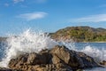 Wave Crashing into a Rock with Copy Space Royalty Free Stock Photo