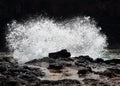 Wave crashing on rocks Royalty Free Stock Photo