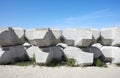 Wave dissipating concrete blocks on a beach Royalty Free Stock Photo
