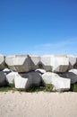 Wave dissipating concrete blocks on a beach Royalty Free Stock Photo