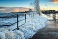 Wave engulfs Amble Pier Royalty Free Stock Photo