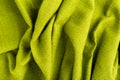 Wave green natural linen fabric textile material texture as a background. green textile pattern for design in fashion as abstract Royalty Free Stock Photo