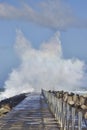 Wave hits the pier-head. Vorupoer Denmark. Royalty Free Stock Photo