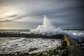 Wave hitting the artificial pool