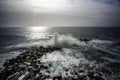 Wave hitting a waterblock in Italy - Riomaggiore