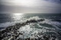 Wave hitting a waterblock in Italy - Riomaggiore