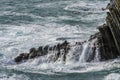 Wave hitting a waterblock in Italy - Riomaggiore Royalty Free Stock Photo