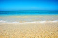 A wave lapping over St Ives beach Royalty Free Stock Photo