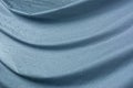 Wave pattern of blue raincoat with water droplets Royalty Free Stock Photo